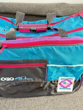 OGIO Teal Duffel Bag with Black, Pink and Purple Trim